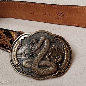 Genuine boa snake skin belt and brass buckle.
